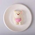 Lily bear in a white plate