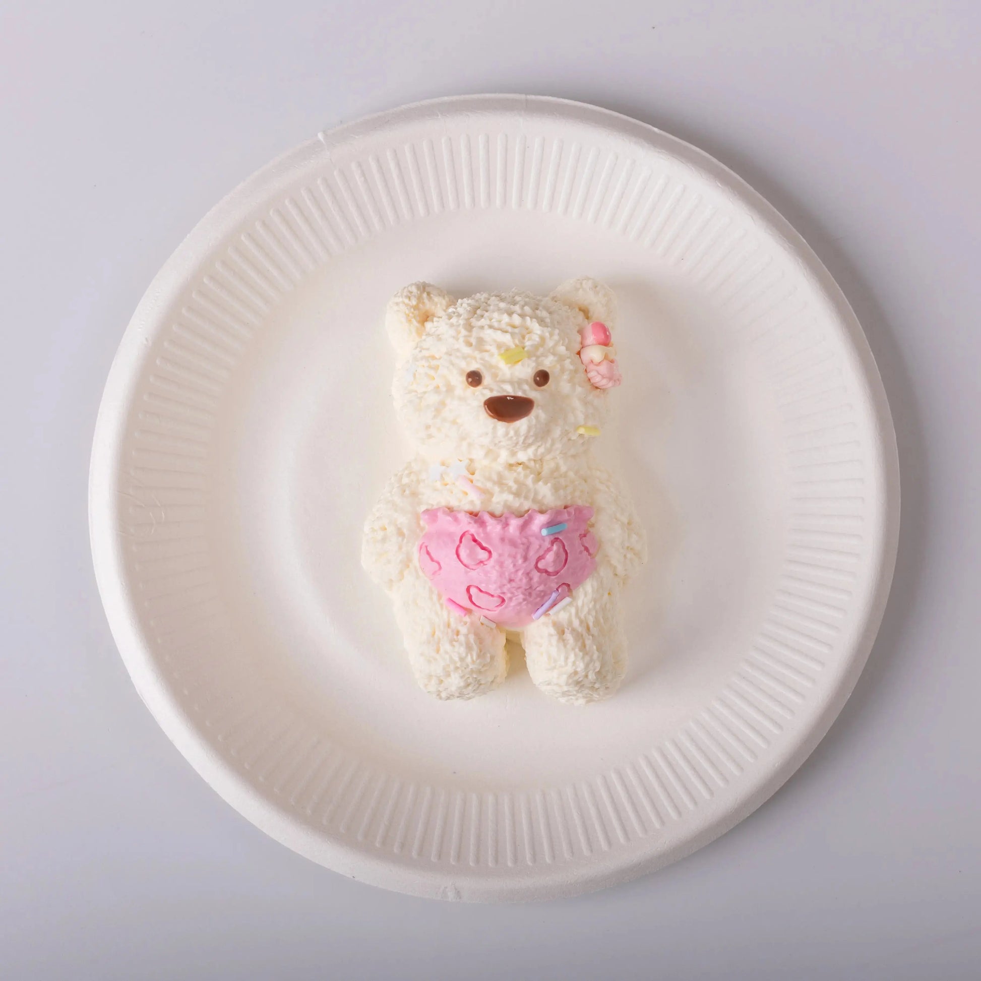 Lily bear in a white plate