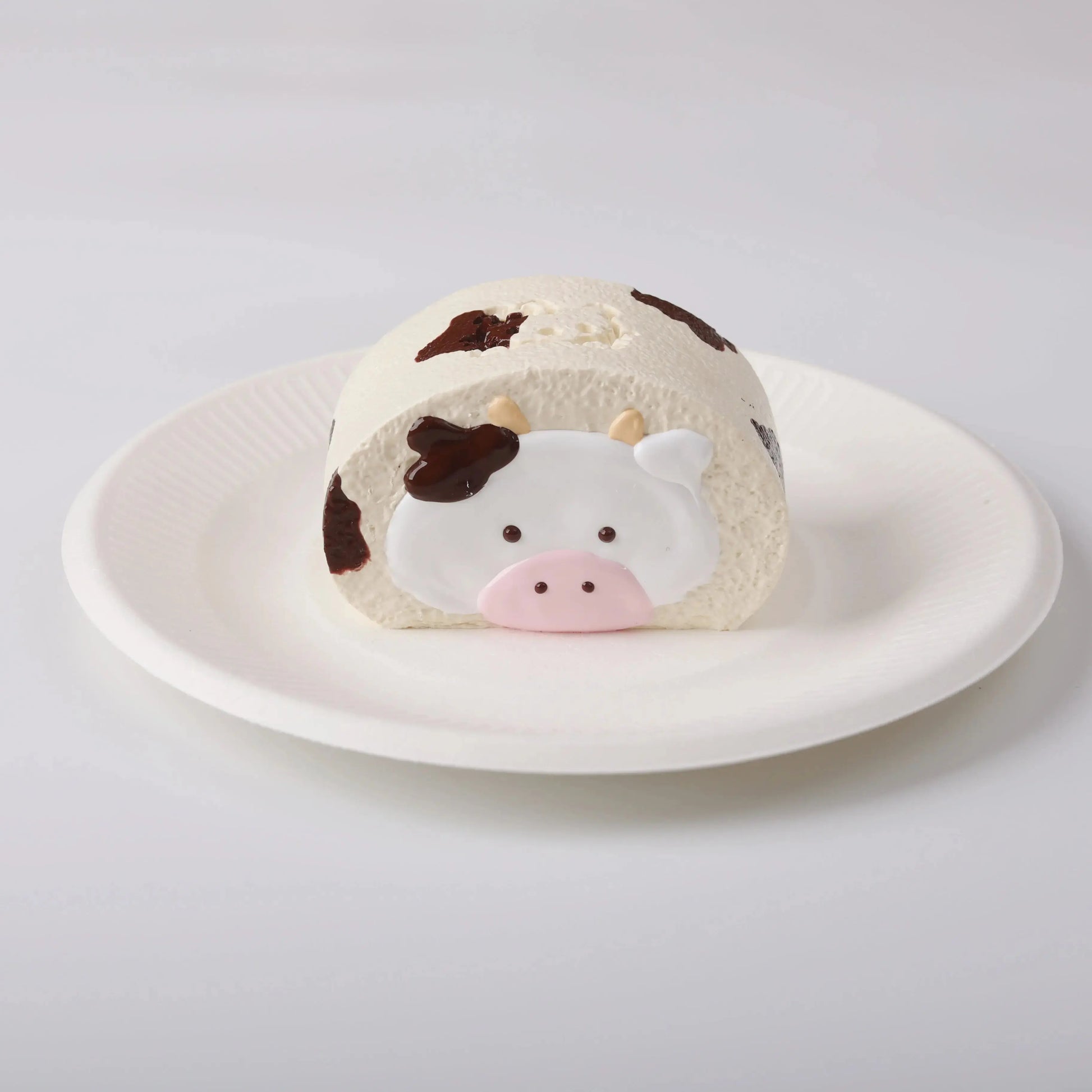 front view of Creamy Tree Cow Swiss Roll Squishy Toy