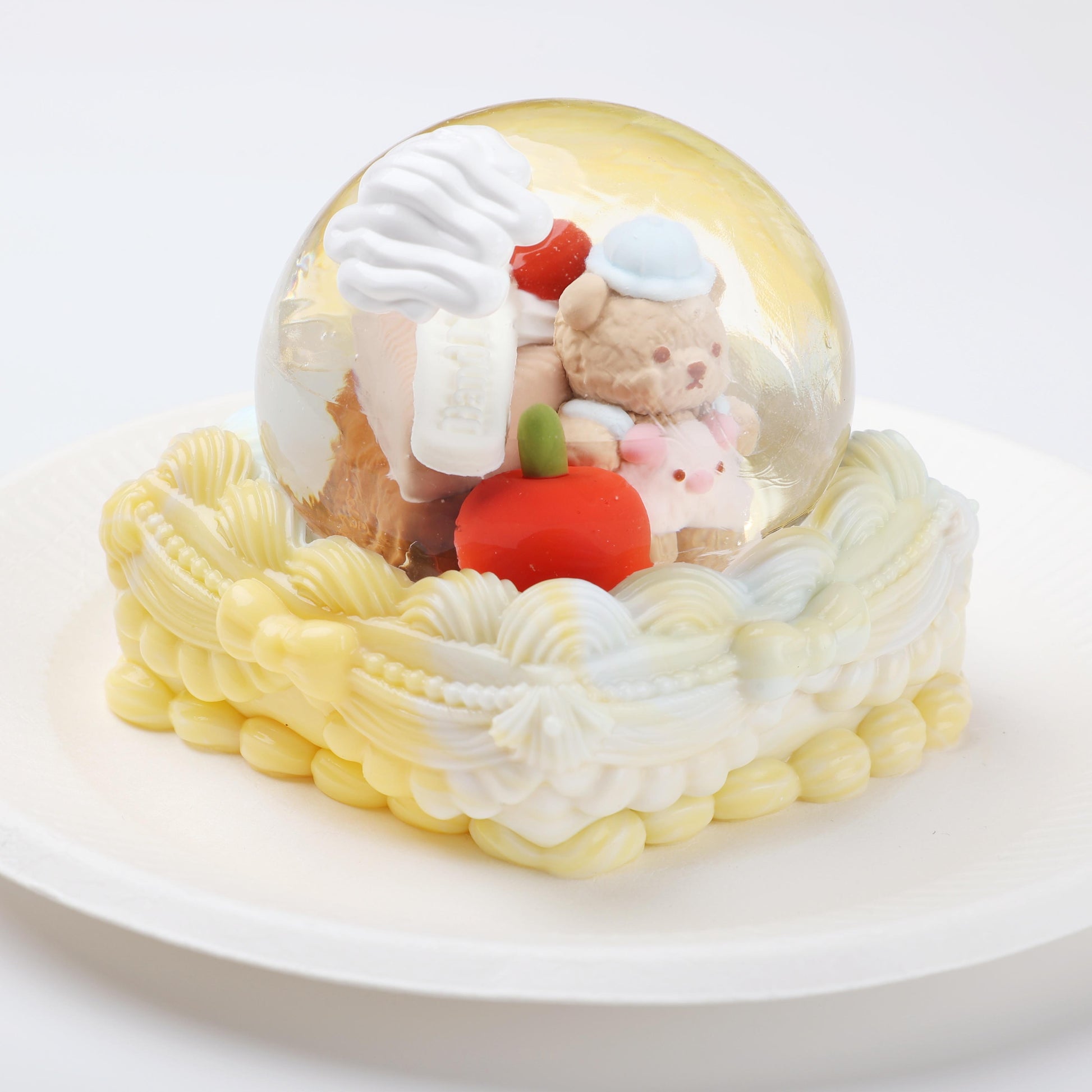 Side view of Creamy Tree Bear Magic Crystal Ball Squishy Toy