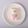 Lily bear in a white plate