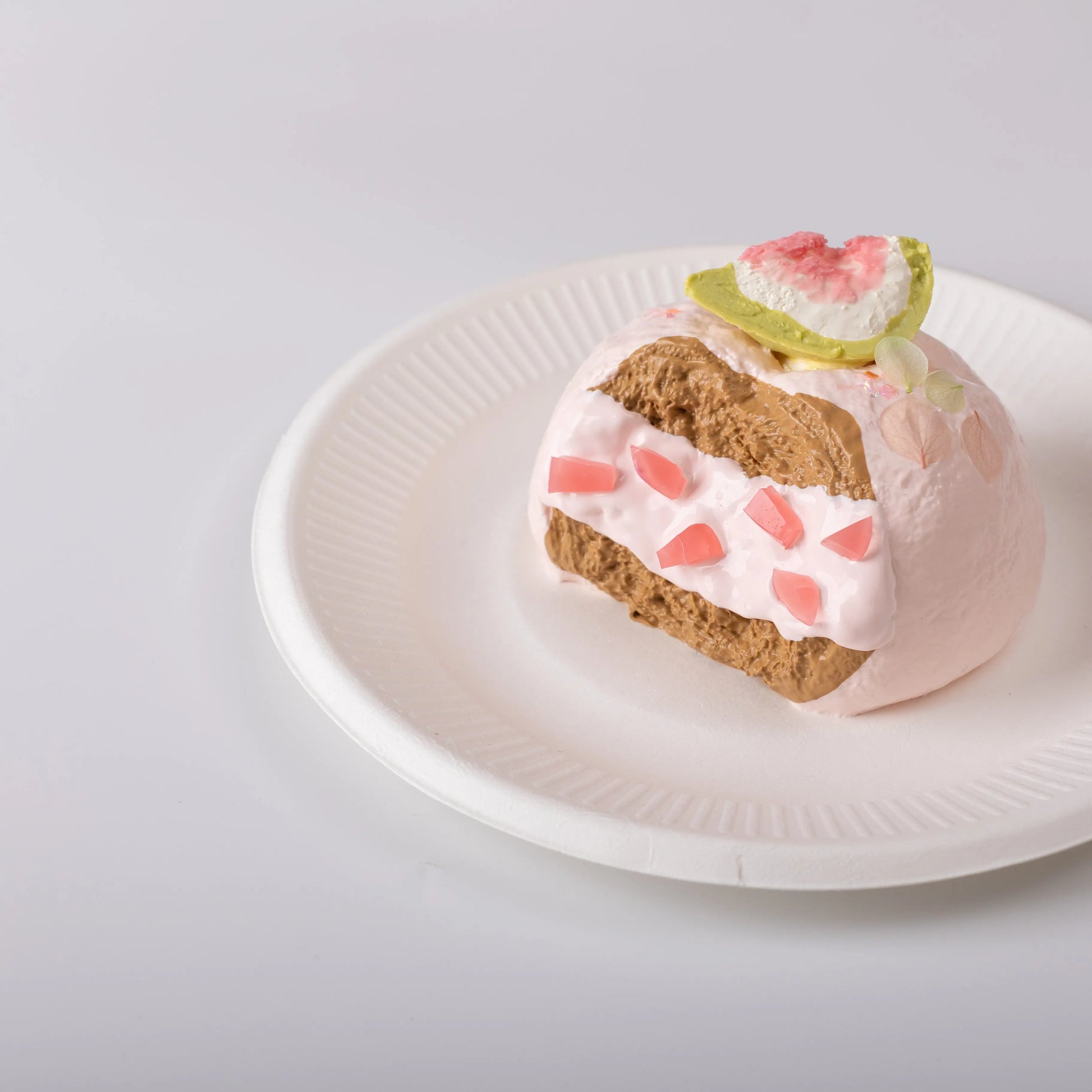 Side view of Creamy Tree Fig Cream Puff Squishy Toy