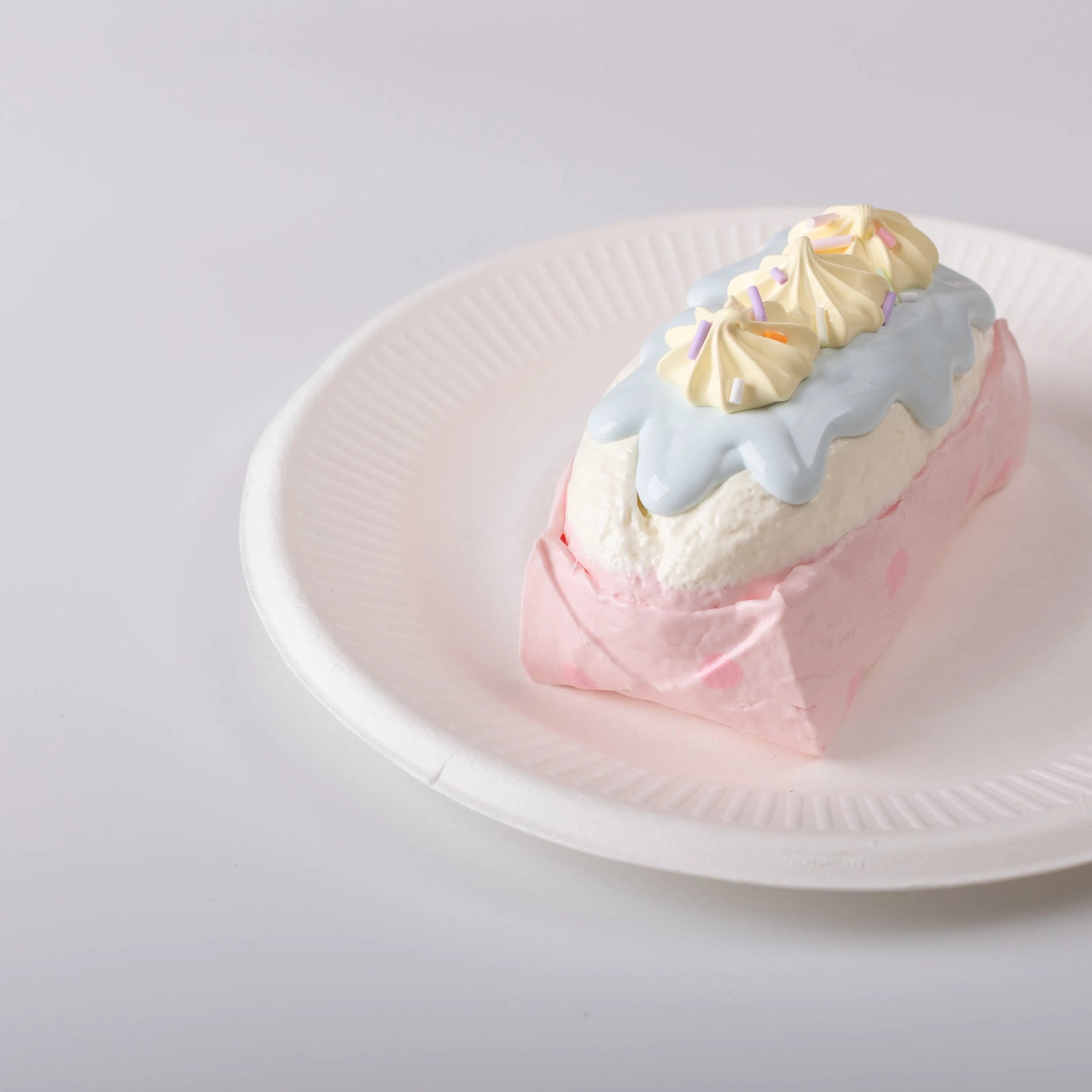 Side view of Cream Bar Cake Squishy Toy