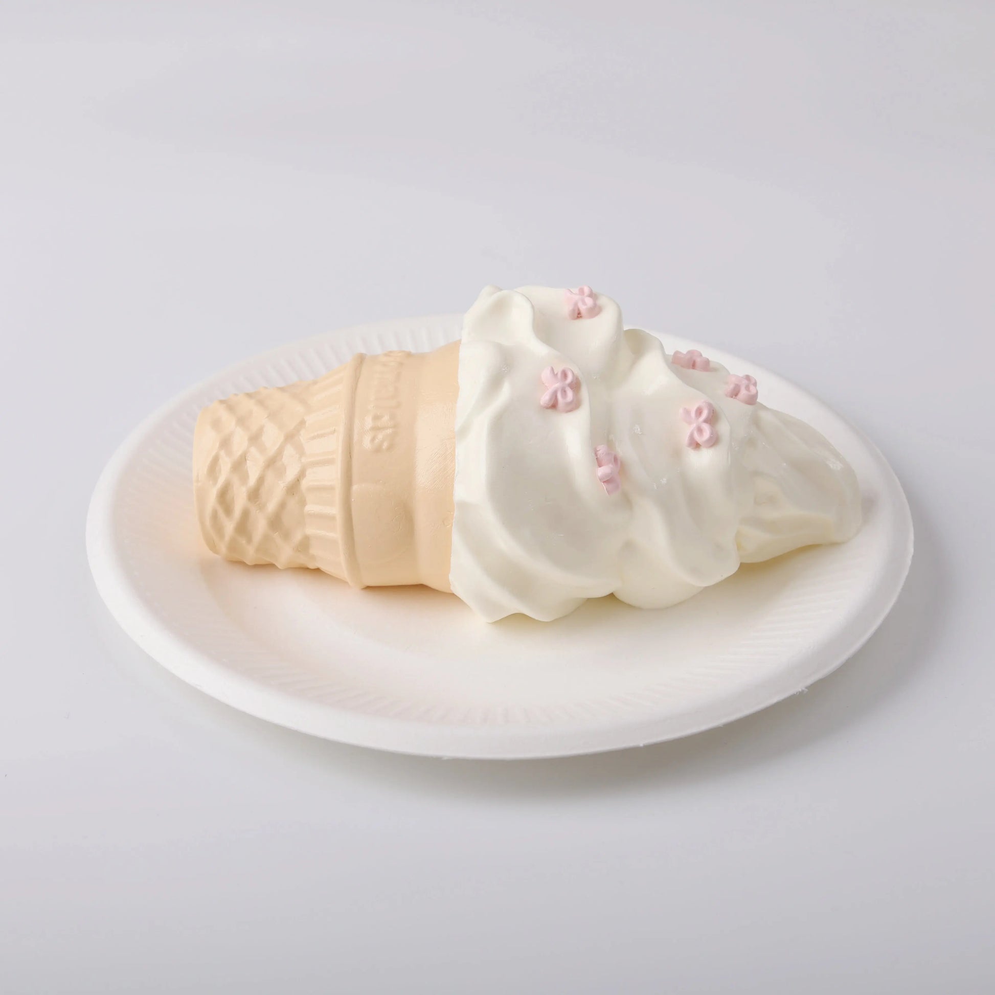 Creamy Tree Vanilla Ice Cream Cone Squishy Toy in a white plate