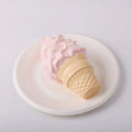 side view of Creamy Tree Strawberry Ice Cream Cone Squishy Toy