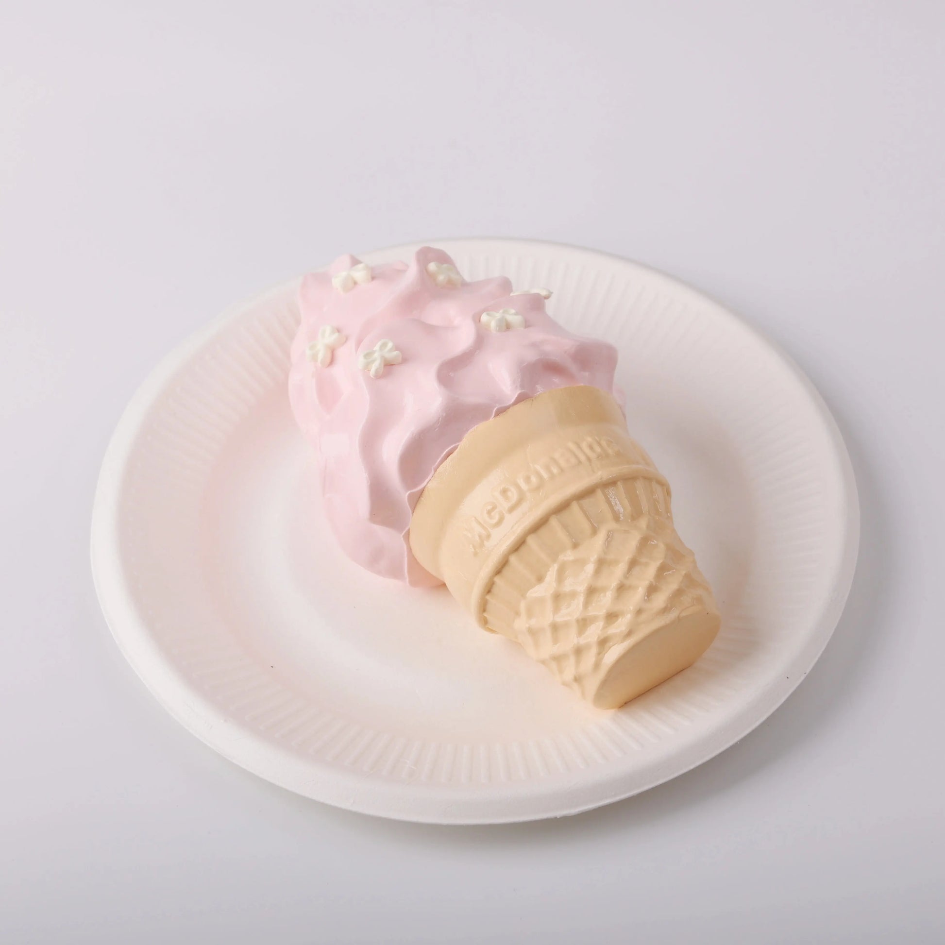 side view of Creamy Tree Strawberry Ice Cream Cone Squishy Toy