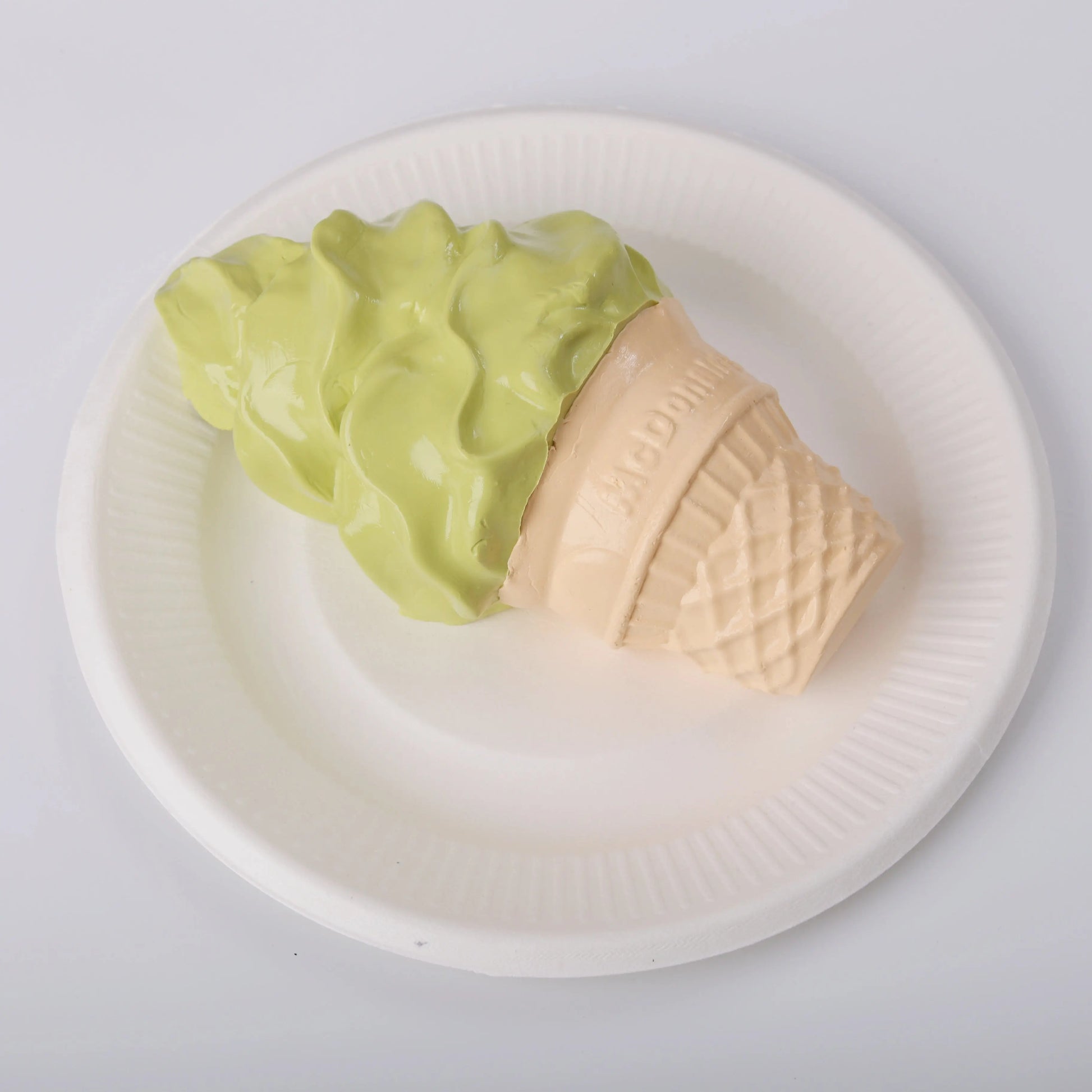 side view of Creamy Tree Matcha Ice Cream Cone Squishy Toy