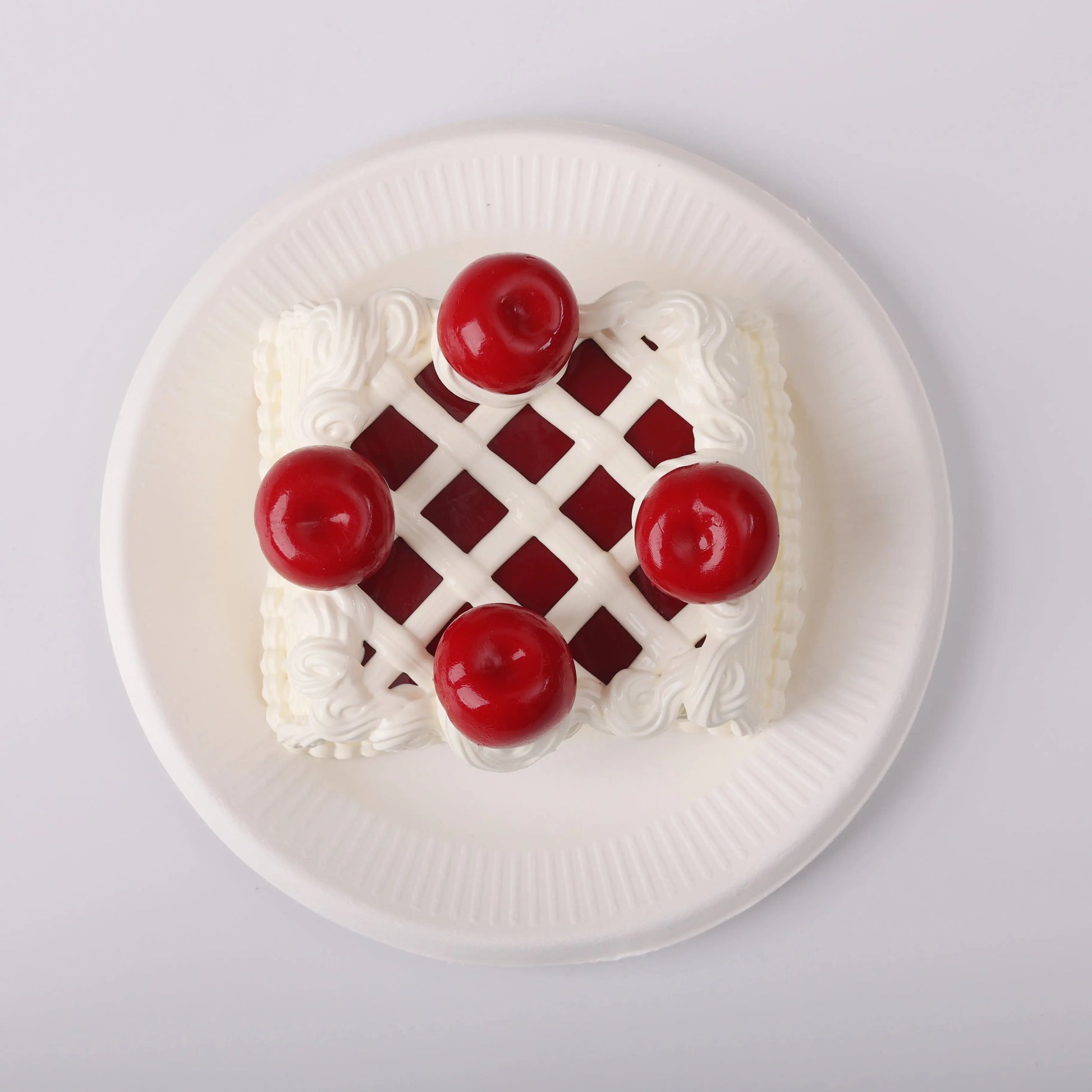 top view of Creamy Tree Sheryl Cherry Cake Squishy Toy