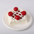 front view of Sheryl Cherry Cake Squishy Toy