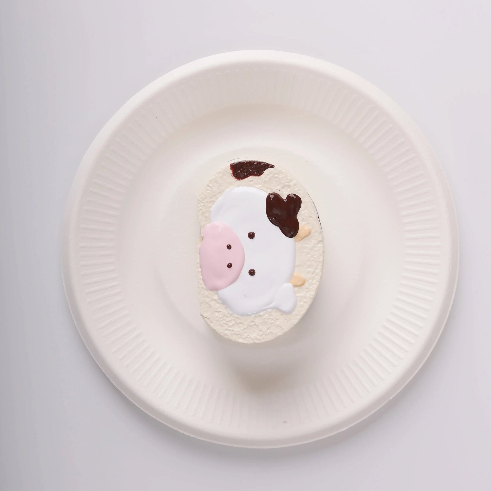 top view of Creamy Tree Cow Swiss Roll Squishy Toy