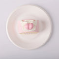 top view of Creamy Tree Heart Angel Roll Squishy Toy