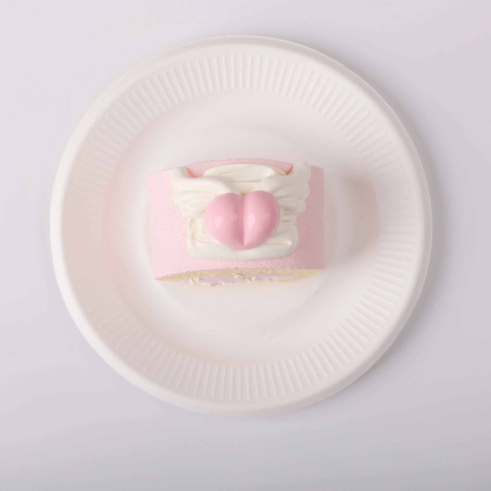 top view of Creamy Tree Heart Angel Roll Squishy Toy
