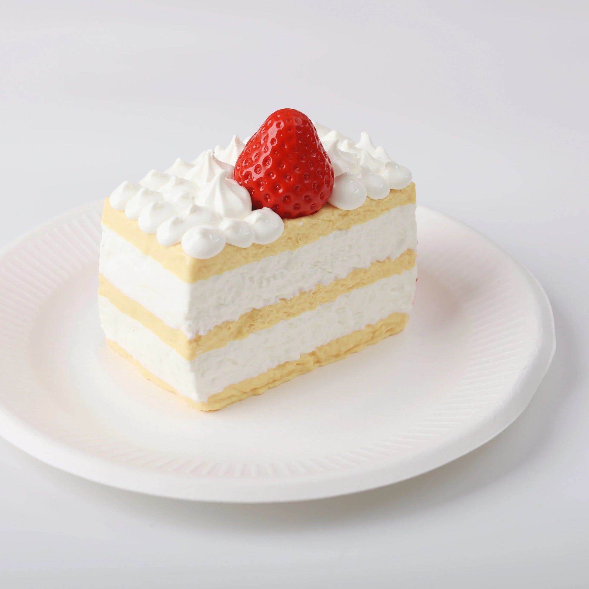 The details of Creamy Tree Strawberry Filled Cake Squishy Toy