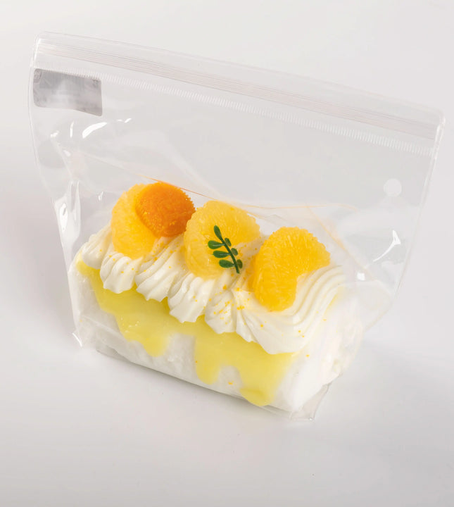 Creamy Tree Orange Roll Squishy Toy