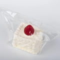 Side view of Berry Cream Cube food squishy toy