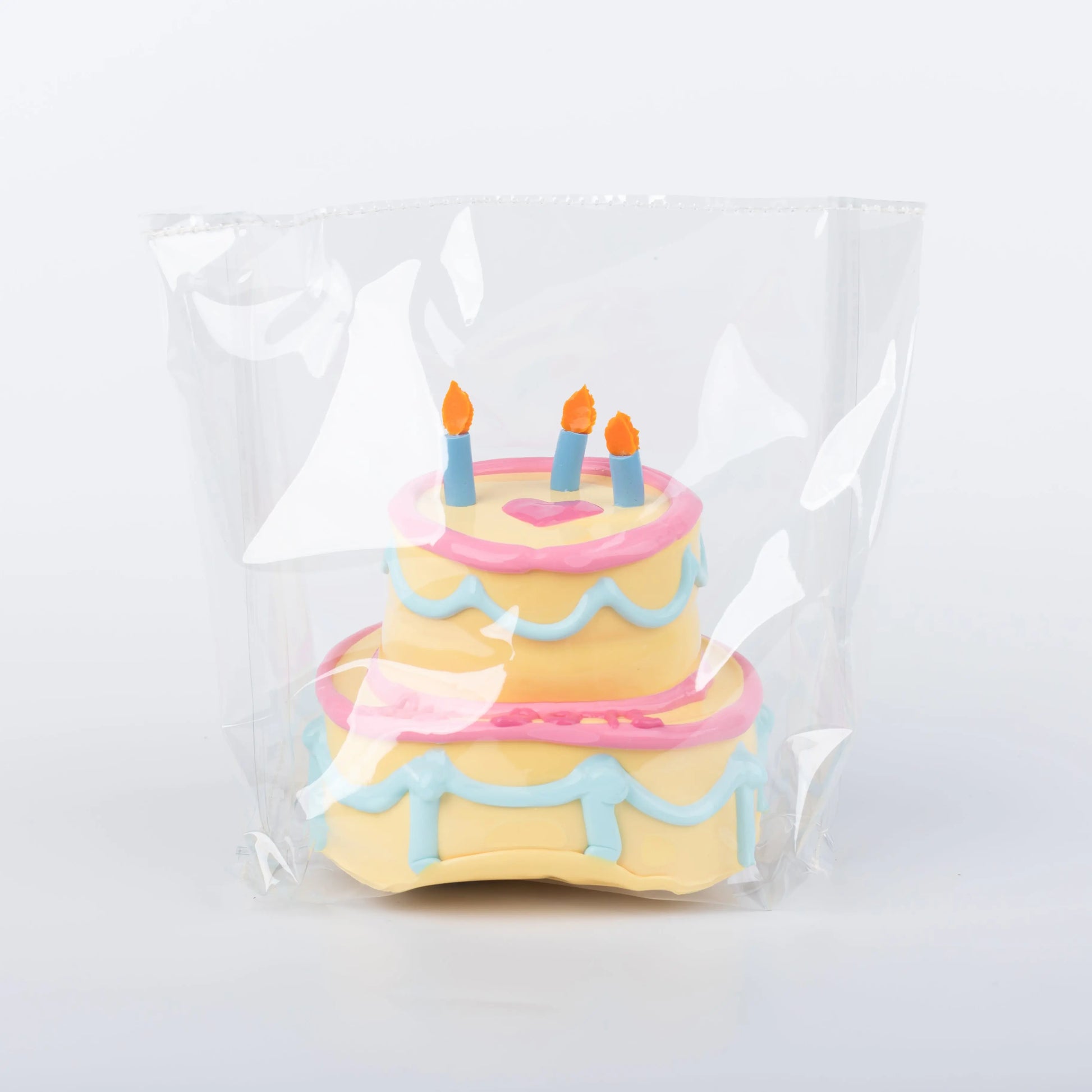 Side view of SpongeBob B-Day Cake food squishy toy