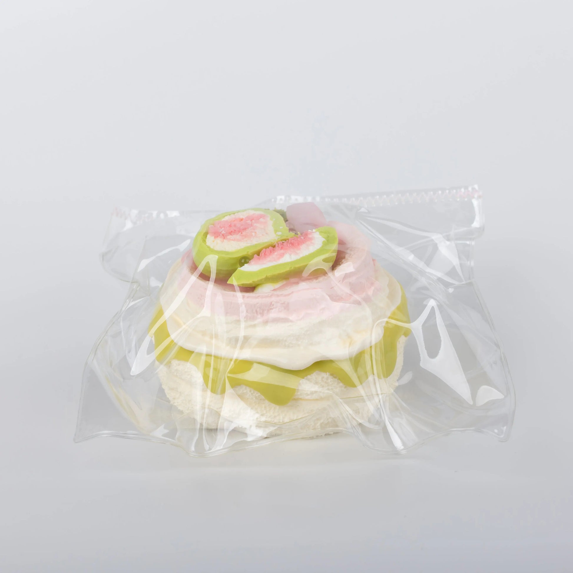 Side view of Fig Muffin food squishy toy