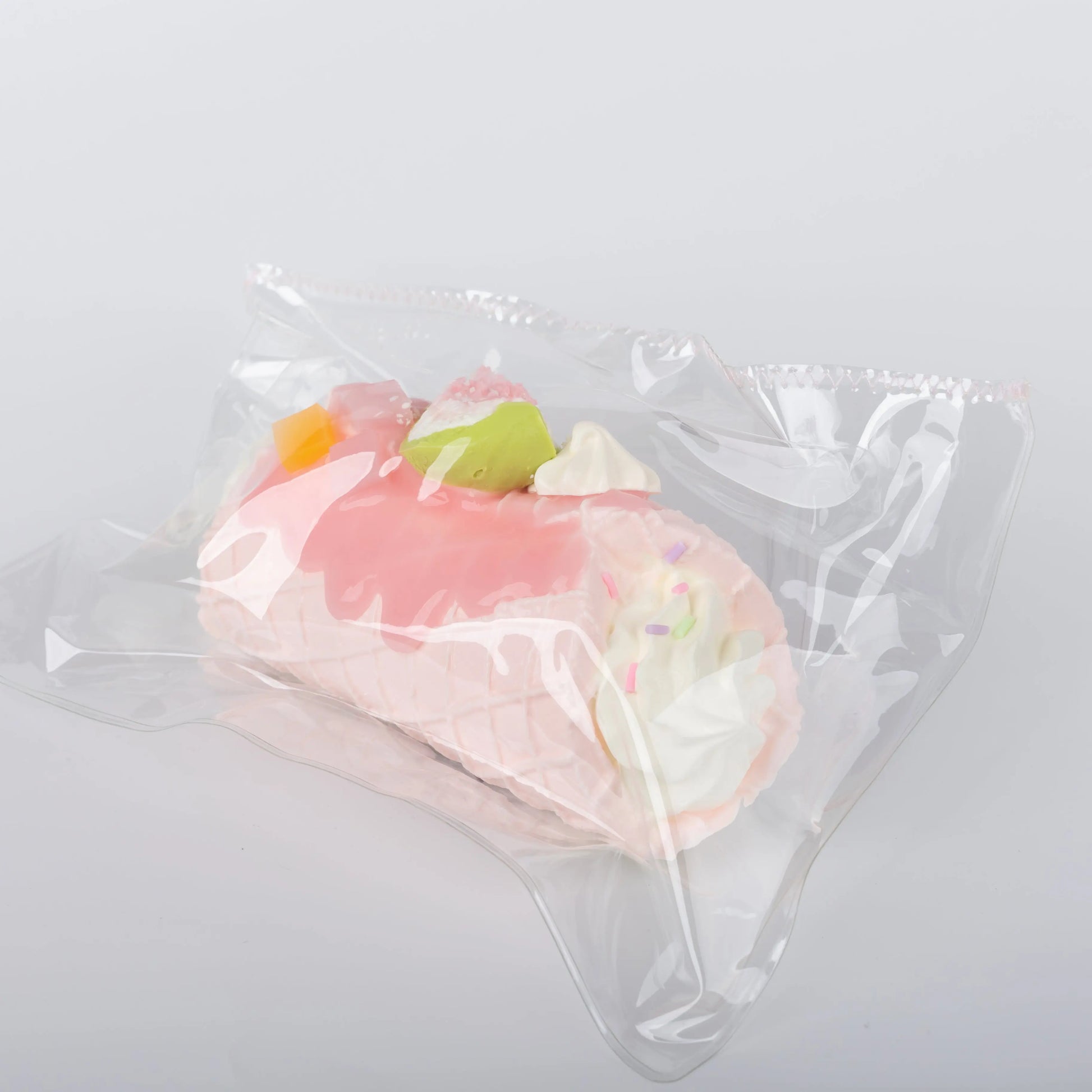 Side view of figs ice cream food squishy toy