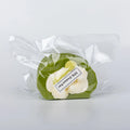 Side view of Matcha Cream Roll food squishy toy