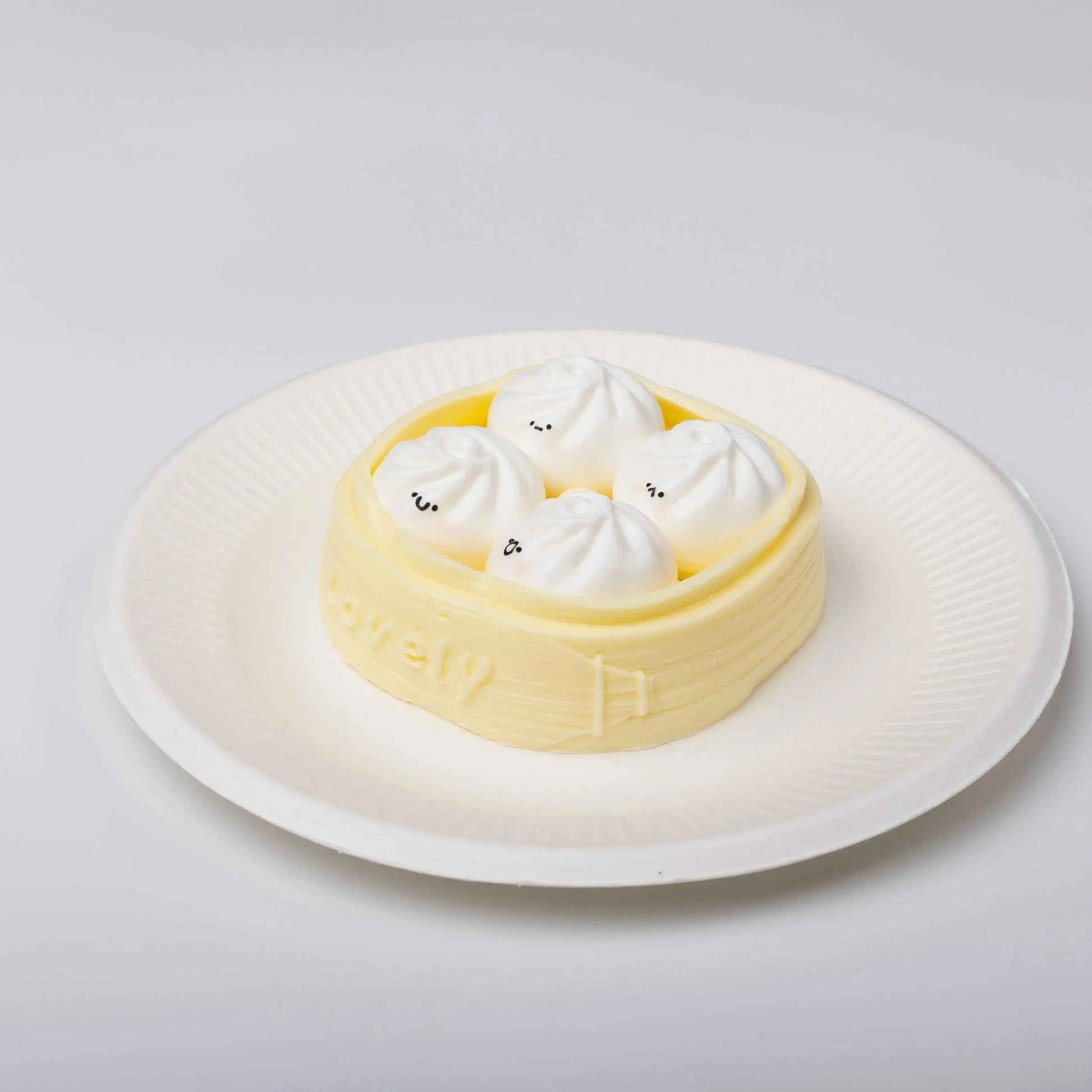 Front view of Creamy Tree Yellow Xiaolongbao Squishy Toy