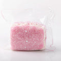 Front view of Creamy Tree Pink Sparkling Bread Squishy toy with flower＆pearl things