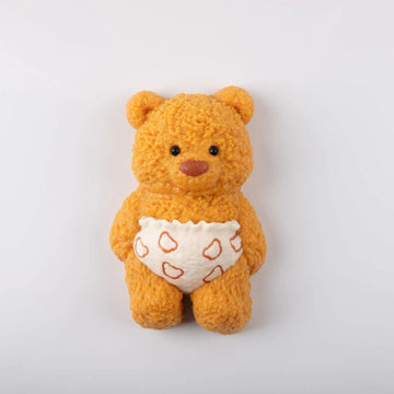 Front view of Creamy Tree teddy bear stress toy with white heart-patterned diaper
