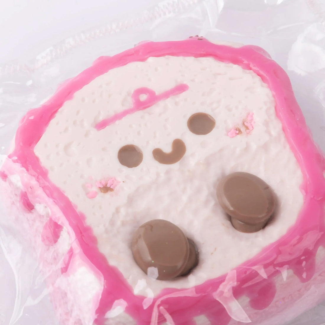 Front view of Creamy Tree Pink JC Toast Squishy toy, this toy takes inspiration from classic plush aesthetics similar to Jellycat’s