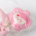 Close-up of Pink Lollipop Squishy toy with an adorable girl face
