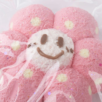 Pink Sunny Flower Squishy toy smiling face close-up