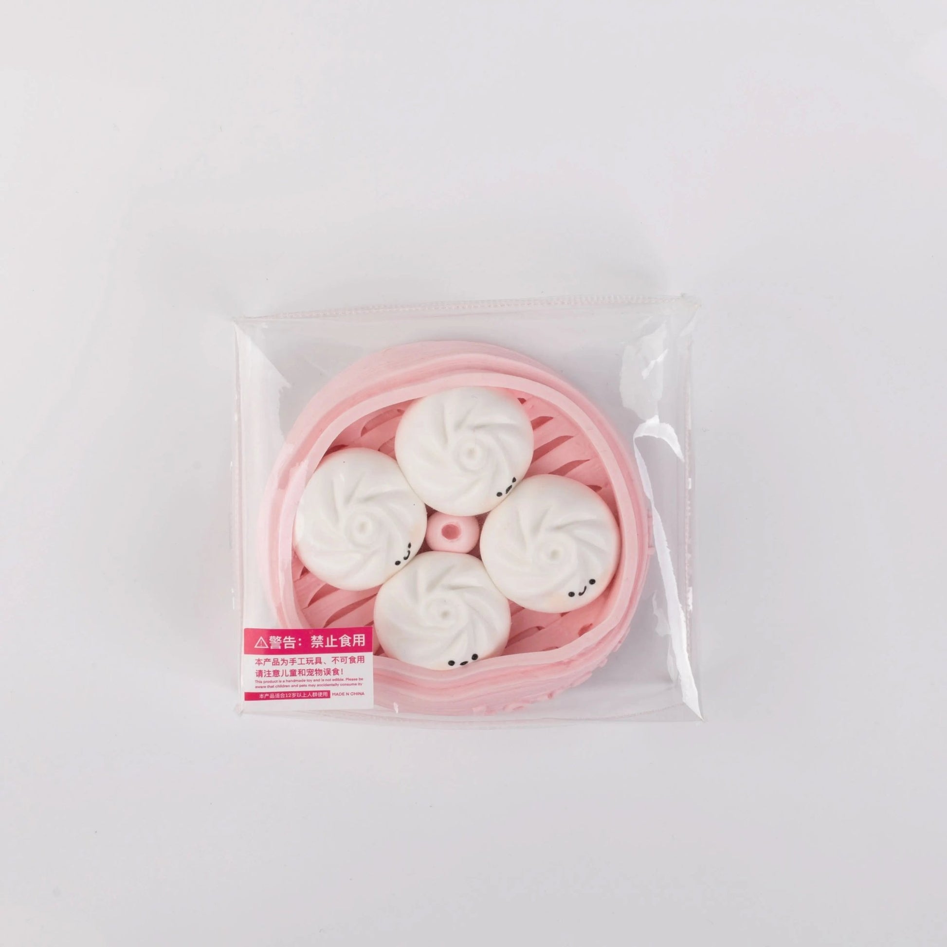 Top view of Creamy Tree pink dumplings squishy toy