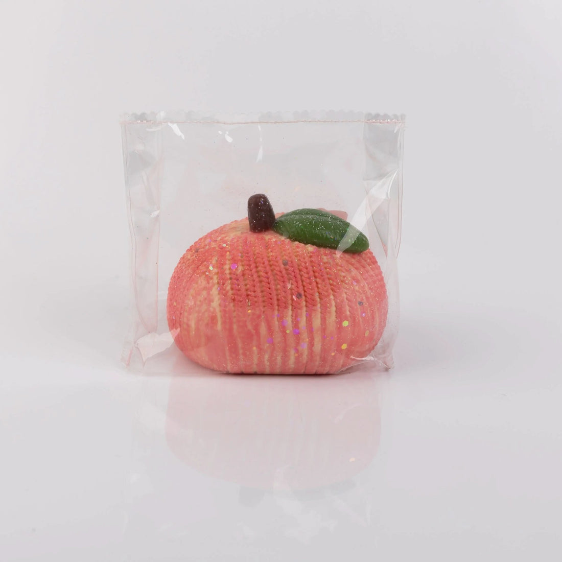 Front view of Creamy Tree Pink Dumplings Squishy toy with cute emotions