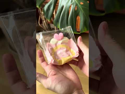 the texture of Creamy Tree Heart Angel Roll Squishy Toy