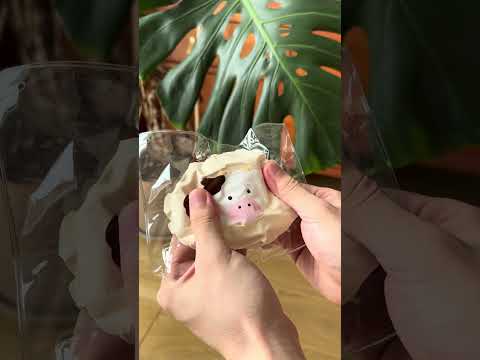 the texture of Creamy Tree Cow Swiss Roll Squishy Toy